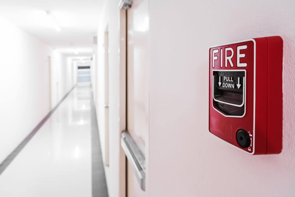 Fire Alarm near door fire exit door .