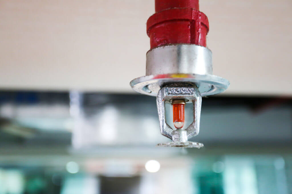 Fire sprinkler and red pipe.